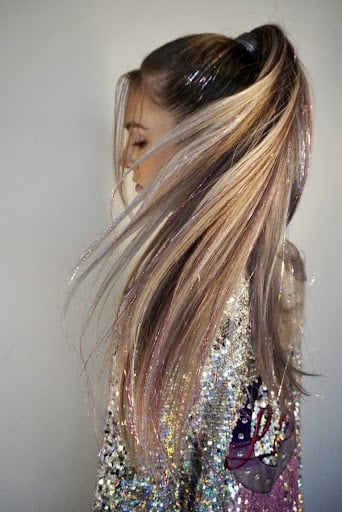 Casey Clark with glittery hair tinsel