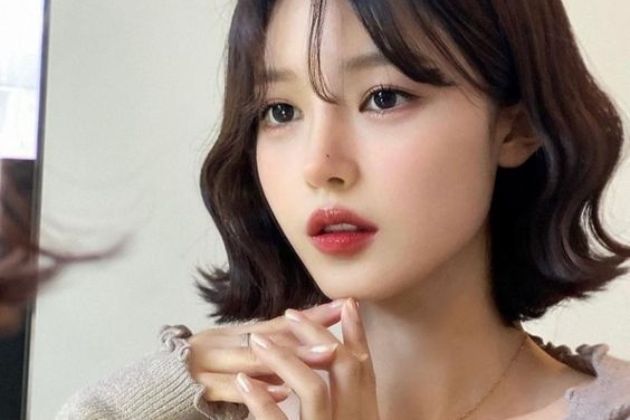 Kiểu tóc layer dài uốn sóng nước mái dài